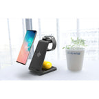 Black and white wireless charging stand on nightstand