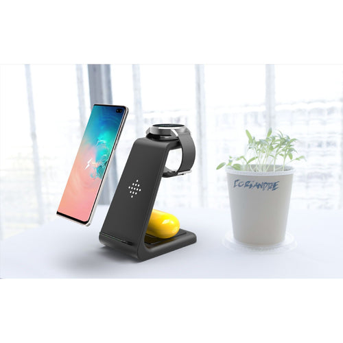 Black and white wireless charging stand on nightstand