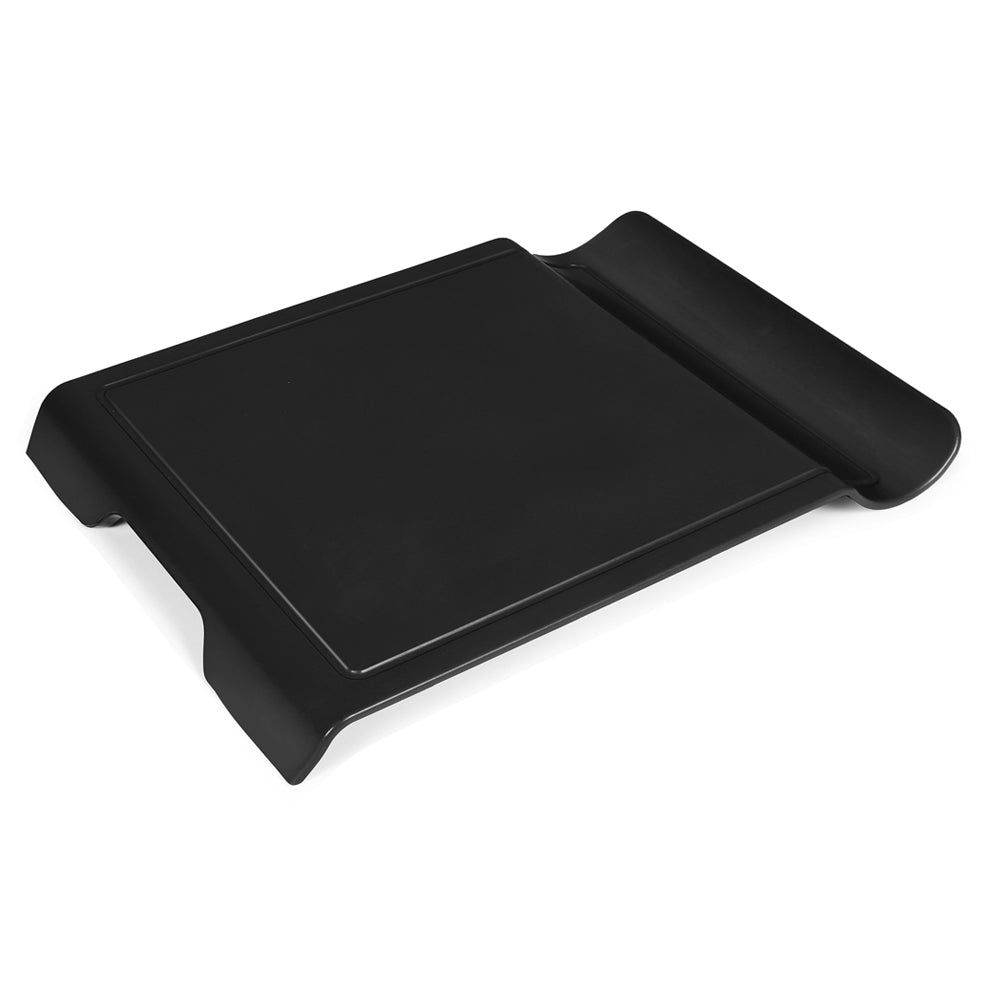 Black foldable U-shaped cutting board on kitchen counter