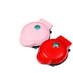 Close-up of mini waffle maker baking plate