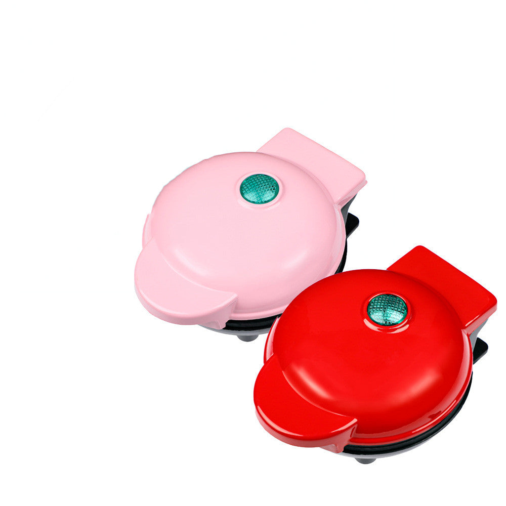 Close-up of mini waffle maker baking plate