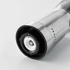 Coffee grinder shown with USB charging cable