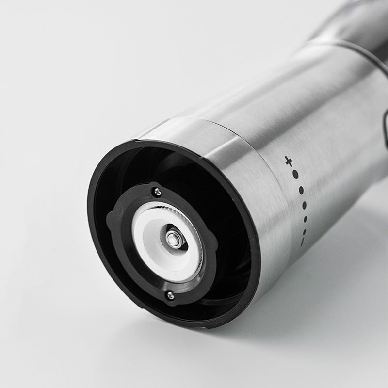 Coffee grinder shown with USB charging cable
