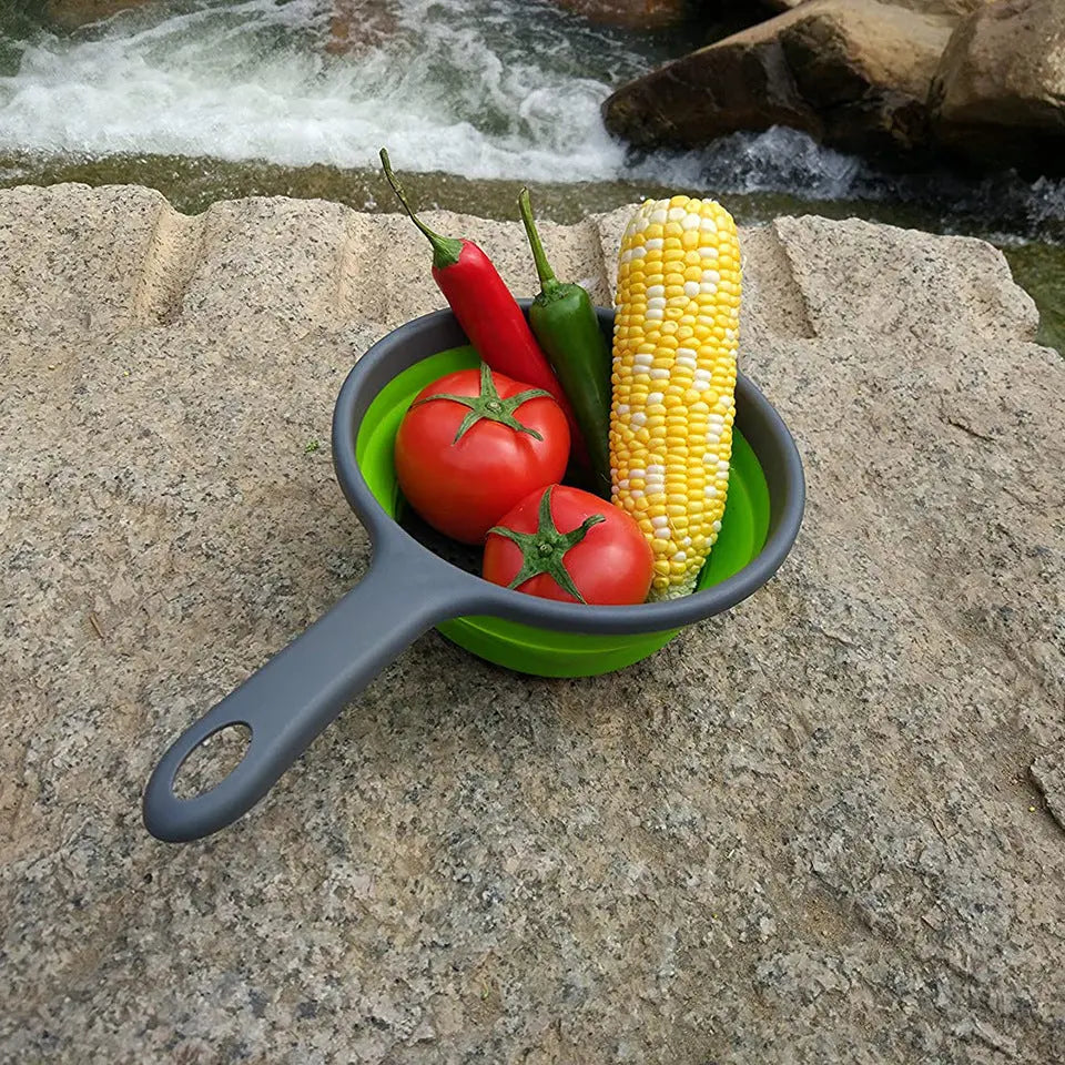 Colander in blue color rinsing fresh produce
