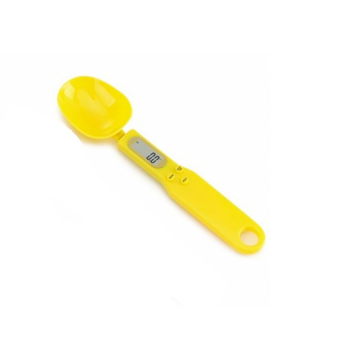 Digital cup scale with LCD display showing weight reading in yellow color