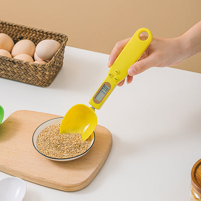 Digital kitchen cup scale with LCD display showing weight reading