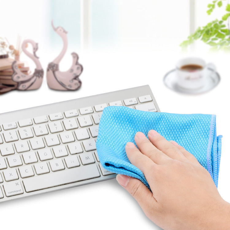 Microfiber cloth wiping down a kitchen surface
