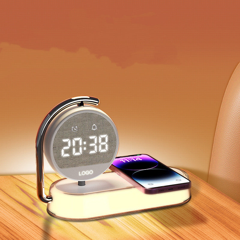 Phone charging wirelessly on desktop clock device
