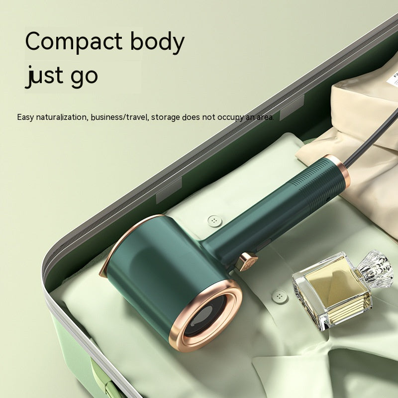 Portable fabric garment steamer in Green color