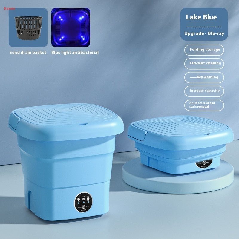Portable mini washer in fruit Blue color on a laundry room floor