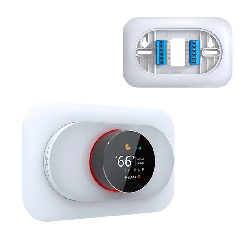 White thermostat control panel installed indoors