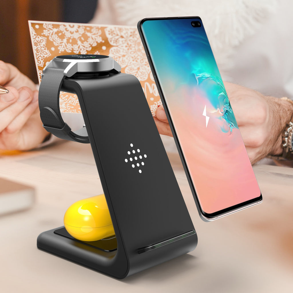 Wireless charging stand holding smartwatch and earbuds case